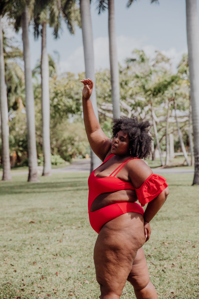women's red one piece swimsuit with one ruffle sleeve