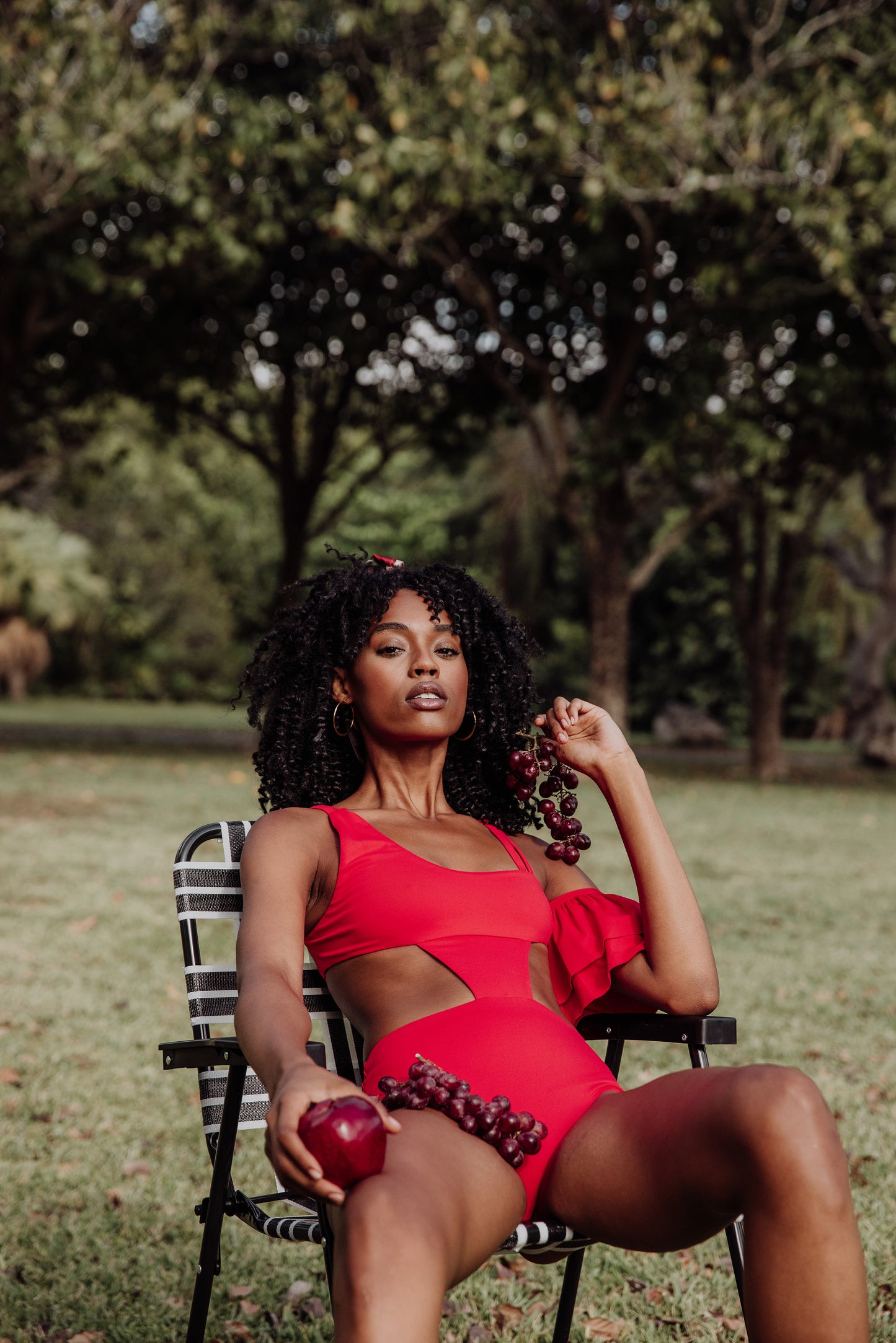 women's red one piece swimsuit with one ruffle sleeve