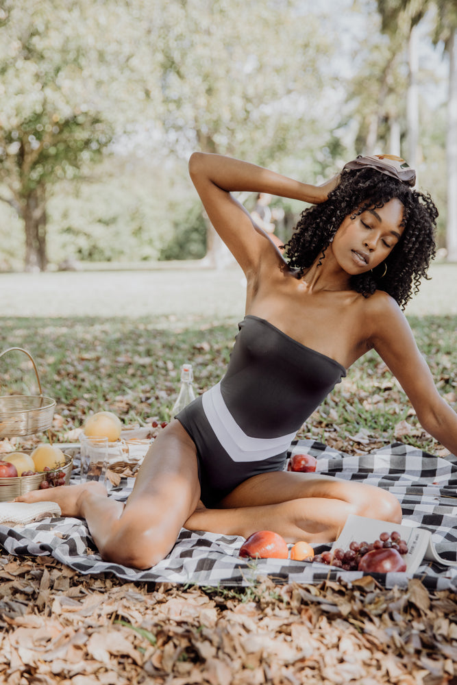 Women's charcoal grey strapless one piece swimsuit