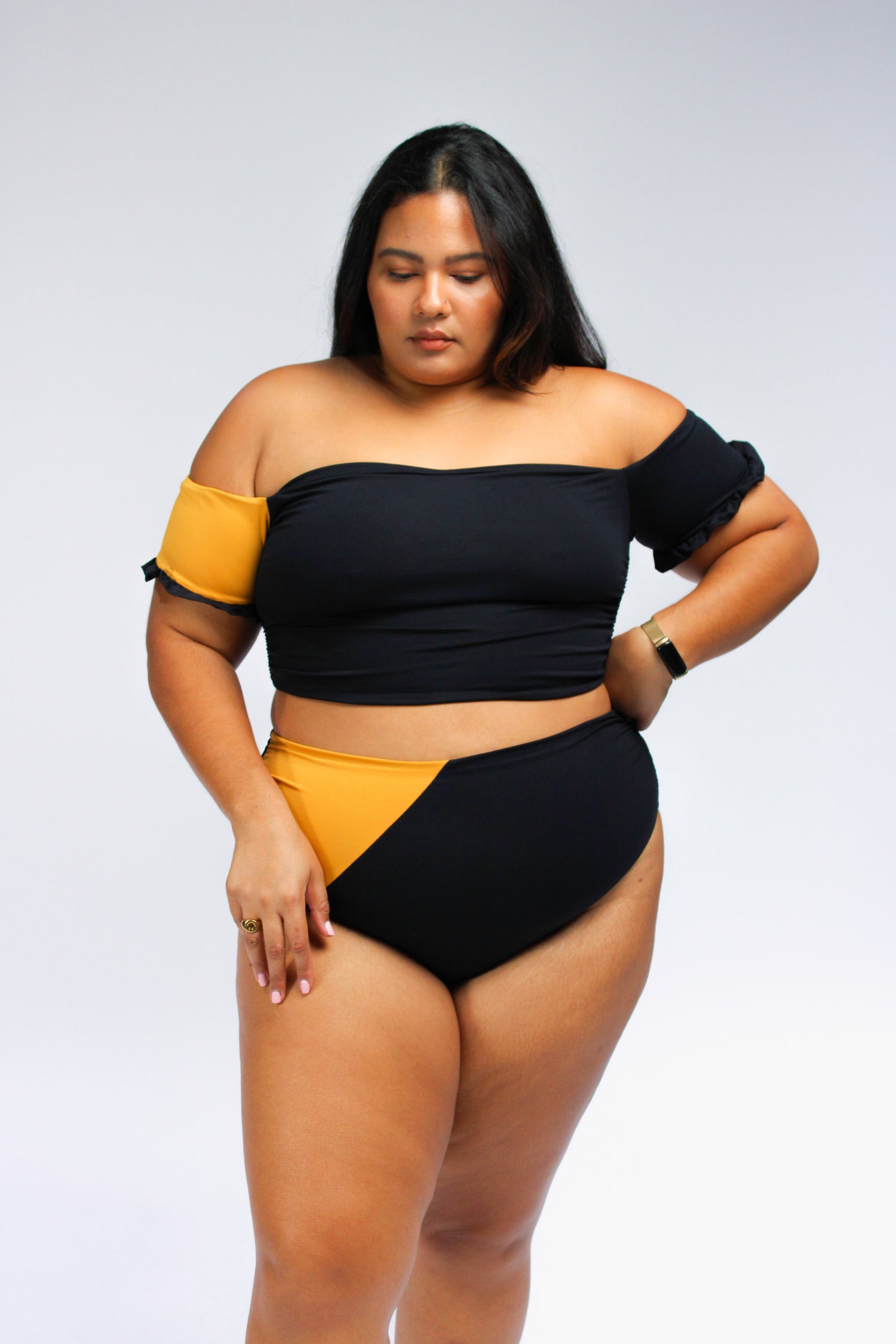 Women's plus size black and yellow full coverage bikini. High waisted bottoms and off the shoulder bikini top with short sleeves