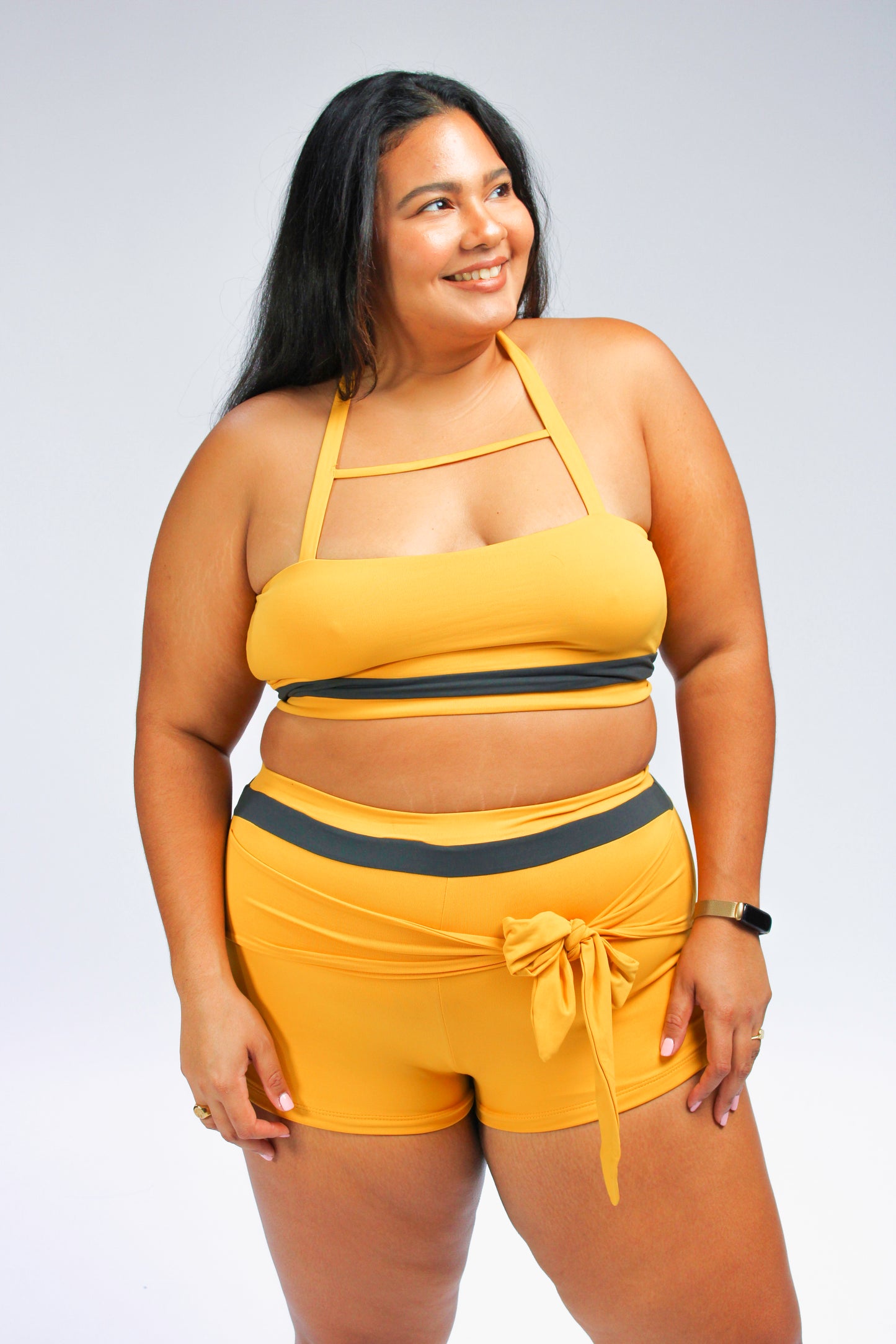 plus size women's yellow high waisted swim shorts and halter bikini top