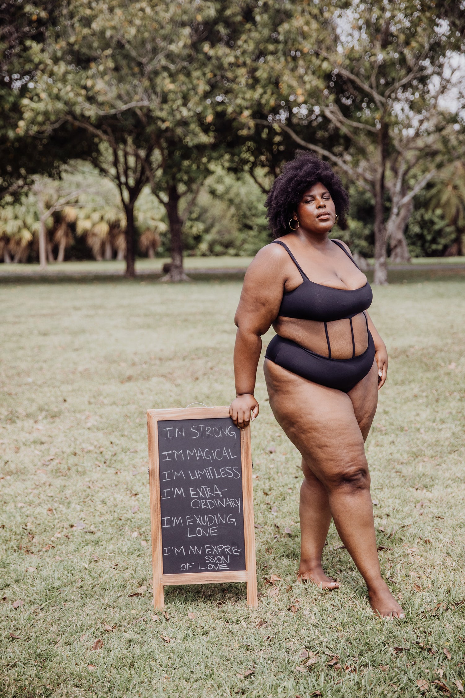 Exposed torso women's plus size one piece swimsuit in black