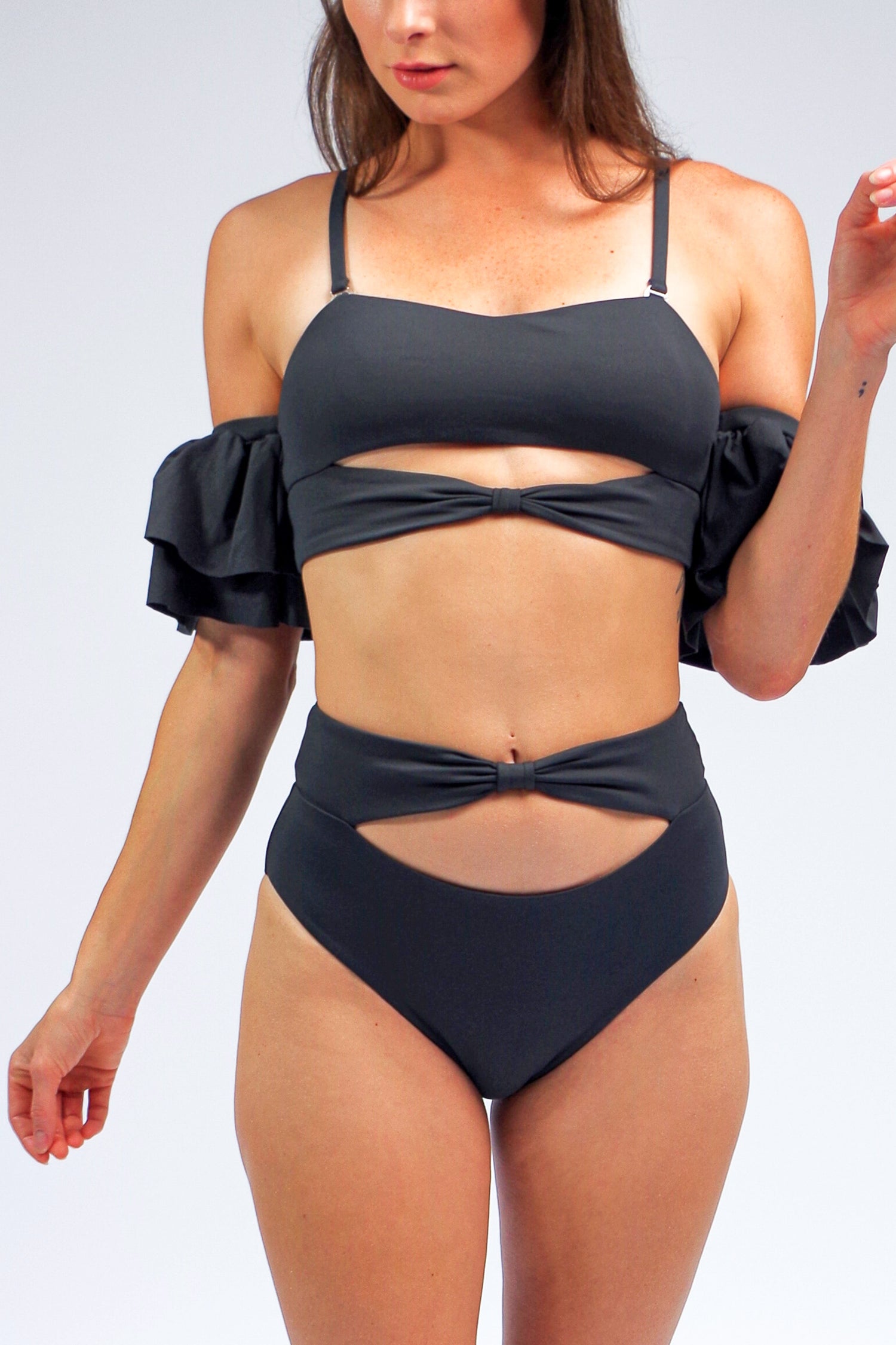 Women's charcoal grey bikini top with ruffle sleeves and cut-out bikini bottom