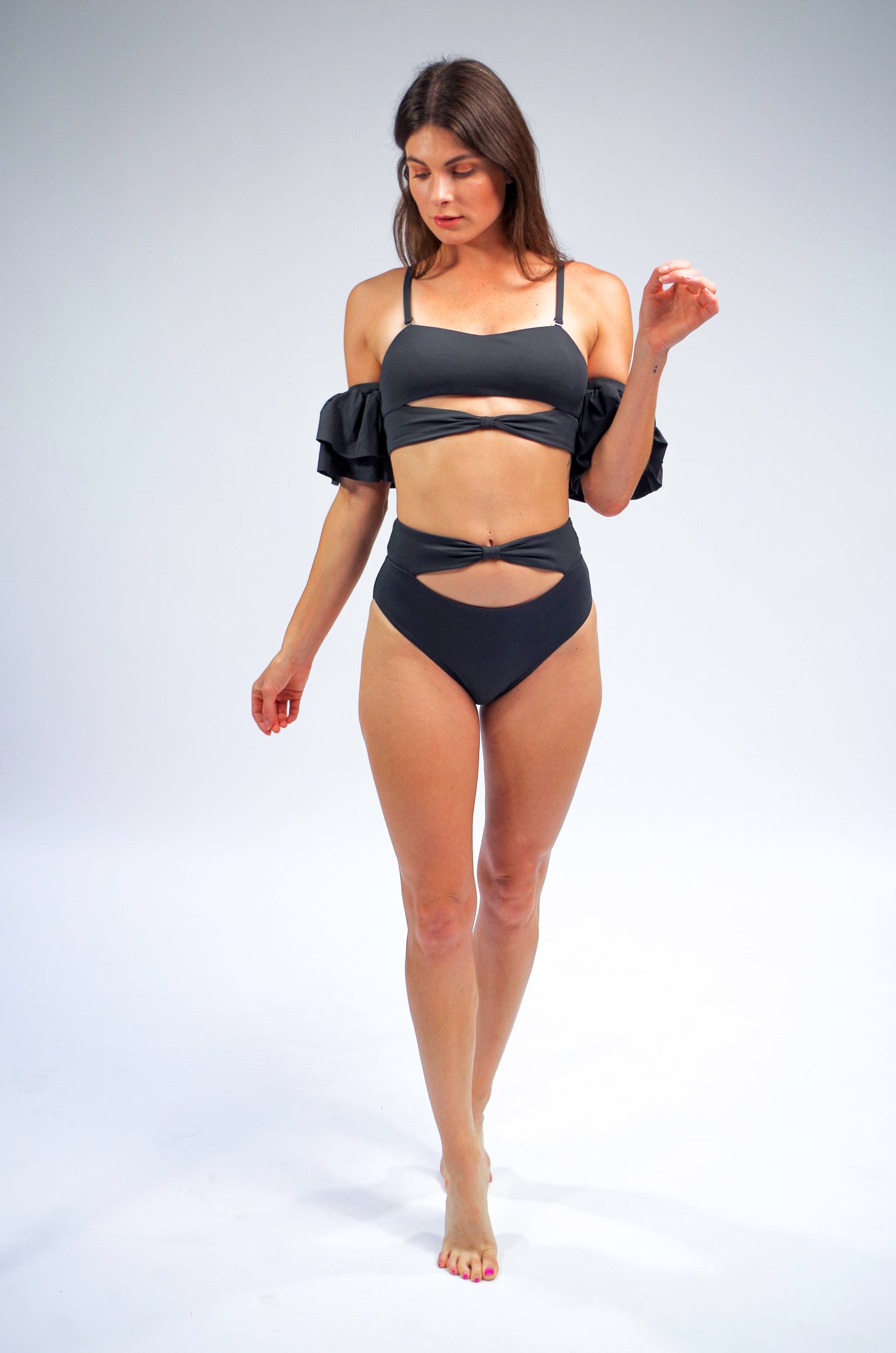 Women's charcoal grey bikini top with ruffle sleeves and bikini bottom with cut out detail