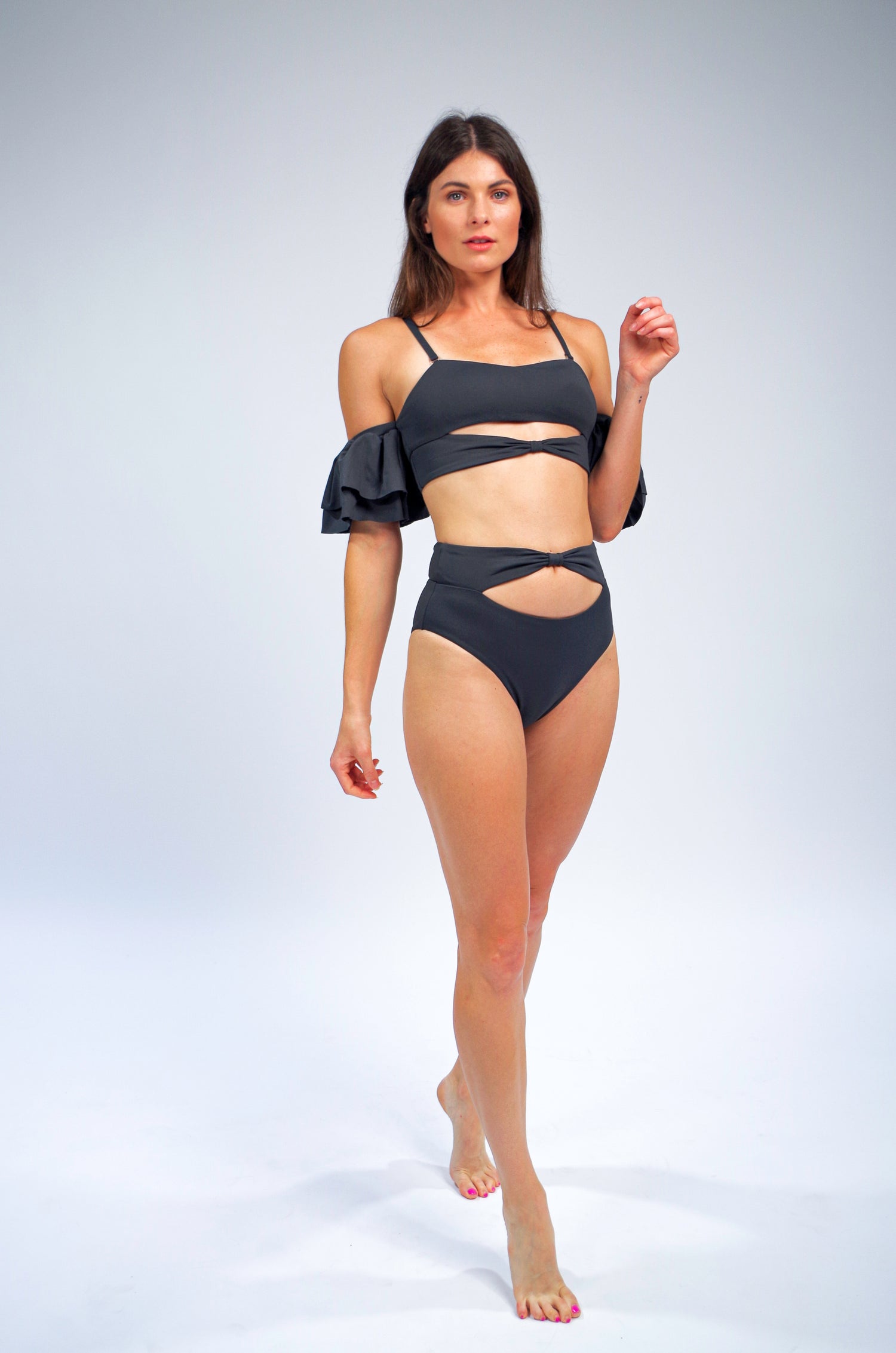 Women's charcoal grey bikini top with ruffle sleeves and bikini bottom with cut out detail