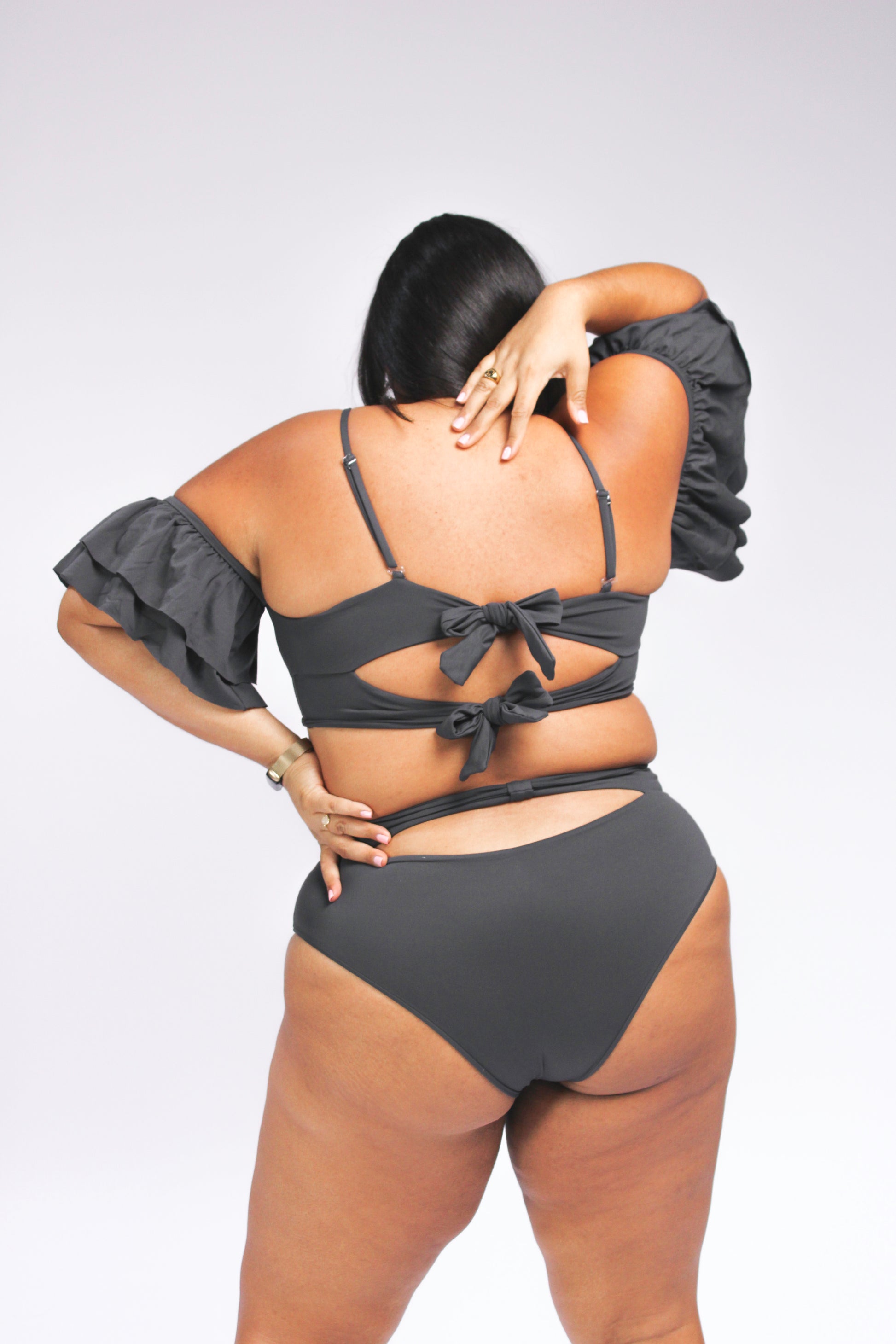 Women's plus size charcoal grey bikini top with ruffle sleeves and bikini bottom with cut out detail